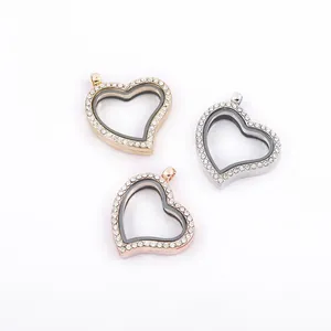 Close-up of three heart-shaped floating lockets in gold, silver, and rose gold.