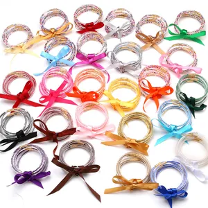 Set di 5 Bracciali Rigidi in Silicone Jelly con Fiocco in Raso e Perline Braccialetto Impermeabile per Donna Gioielli
