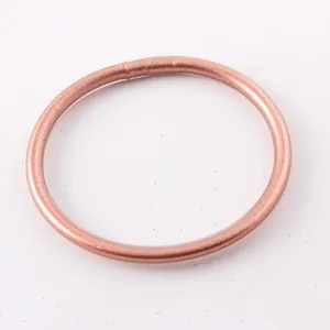 Detailed close-up of a glitter-infused rose gold silicone bangle with smooth surface