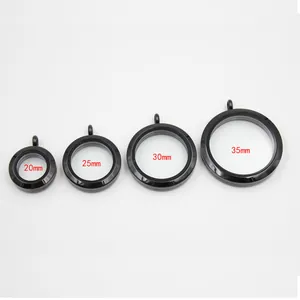 Detailansicht von vier schwarzen Floating Lockets aus Edelstahl in den Größen 20mm bis 35mm