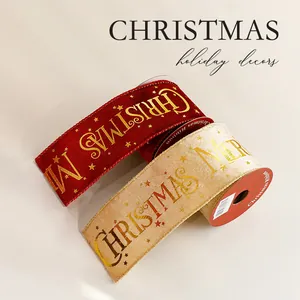 Red and beige gold foil Christmas ribbons with Christmas star patterns on rolls