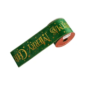 Green velvet Christmas ribbon with gold foil Merry Christmas text and stars.