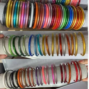 Detail view of colorful 65mm silicone bracelets with shimmery finish on display