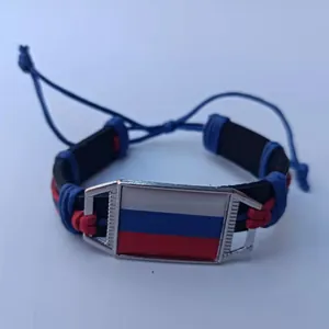 Woven paracord bracelet featuring a Russian national flag emblem on a metal plate