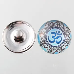 18mm Noosa snap button featuring blue Om symbol under glass cabochon for DIY jewelry