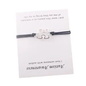 Bracelet fait main de sensibilisation à l'autisme avec breloque puzzle sur carte