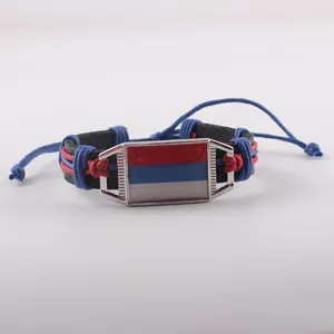 Hand-woven vintage leather bracelet featuring a red blue and white flag emblem charm