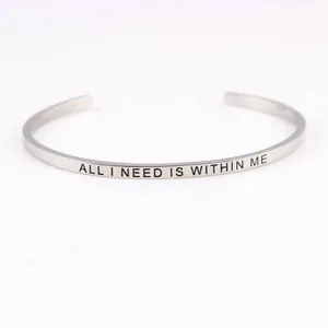 Silver stainless steel mantra bangle engraved with All I Need Is Within Me