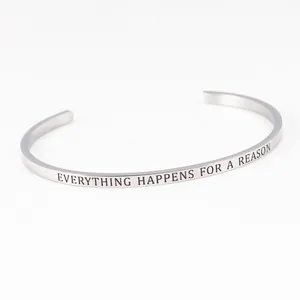 Close-up of stainless steel mantra bracelet with Everything Happens For A Reason engraving