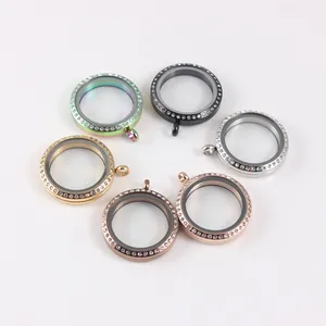 Collection de médaillons flottants de 34mm en acier inoxydable avec strass et finitions variées.