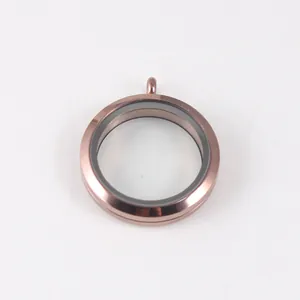 Detailed view of rose gold stainless steel round glass locket pendant with screw closure