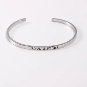 Elegant minimalist silver stainless steel open cuff bracelet engraved with Soul Sisters