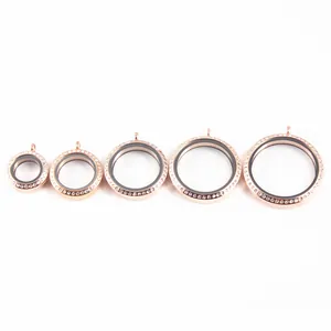 Detailed view of rose gold stainless steel round lockets with rhinestones in five sizes