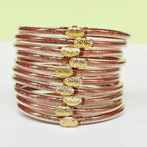Set di 10 braccialetti glitter oro rosa scintillanti con eleganti chiusure a loto