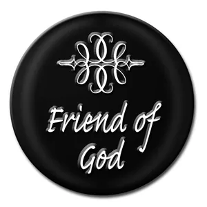 Detailed close-up of a black Noosa snap button featuring Friend of God embossed text