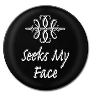 Close-up of black Noosa snap button with Seeks My Face text