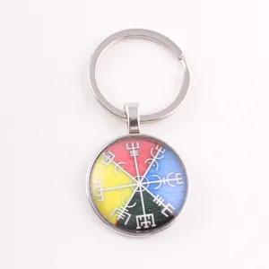 Close-up of Viking Vegvisir compass keychain with multi-colored glass pendant