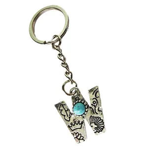Vintage silver stainless steel letter W keychain with turquoise stone floral engraving