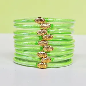 Bracelets Joncs en Silicone à Neuf Couches Style Bohème pour Femmes Remplissage Pailleté Fait Main Avec Breloque Lotus Dorée Bijoux Tendance