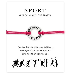 Bracelet de gymnastique rose avec pendentif gravé sur une carte de motivation