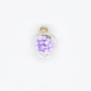 Detailed view of 16mm transparent glass ball pendant with purple foam beads for DIY.