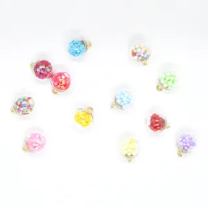 Detail view of 16mm colorful glass ball charms with star fillings for DIY jewelry making.