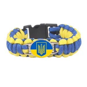 Handmade paracord survival bracelet featuring Ukrainian flag and coat of arms design