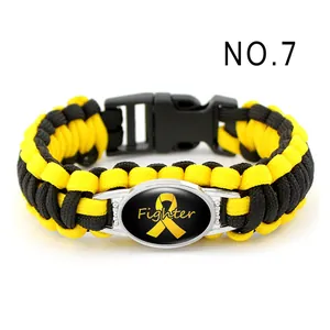 Bracciale in paracord giallo fatto a mano con emblema a nastro Fighter per uso esterno