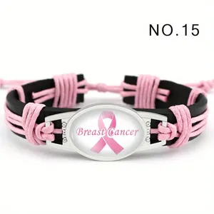 Pulsera de cuero hecha a mano sensibilización cáncer de mama con lazo rosa y cristal