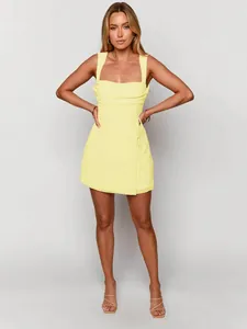 Professional detail view of light yellow square neck Y2K mini dress with side tie detail.