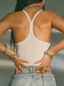 Detailed back view of a sexy beige ribbed knit backless tank top for women summer style