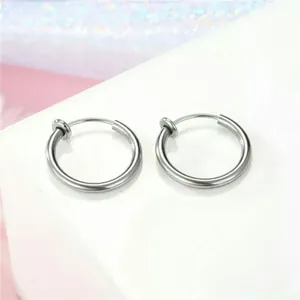 Close-up detail view of silver stainless steel clip-on hoop earrings for non-pierced ears