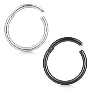 Detailed macro view of 316 stainless steel seamless hinged piercing hoops in silver and black.