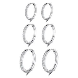 Set of three pairs of stainless steel hoop earrings with sparkling cubic zirconia detail