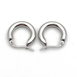 Detail view of 4mm silver stainless steel hoop earrings with high polish finish
