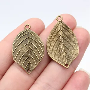 Vintage Bronze Metall Blatt Anhänger Verbinder für DIY Schmuckherstellung 33x20mm