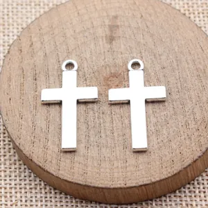 Coppia di ciondoli a croce in argento su legno per creazione gioielli DIY 29x16mm.