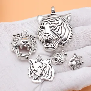 Set of 5 unique antique silver tiger head charms and pendants for DIY jewelry making