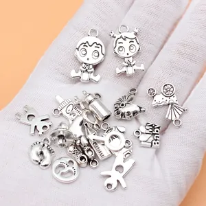 18-piece baby themed alloy charm set including bottles, strollers and feet for jewelry making
