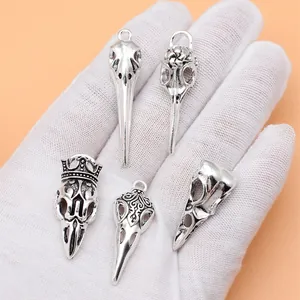 Set of 5 ancient silver bird skull charms for DIY jewelry making and gothic crafts
