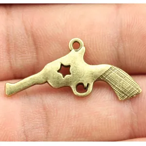 Unique vintage bronze gun shaped alloy charm pendant for creative DIY jewelry making projects