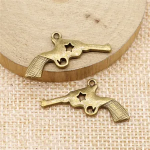 Vintage style antique bronze pistol charm pendants for DIY jewelry making size 31x18mm