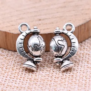 Antique silver globe charm for DIY jewelry making with realistic world map details