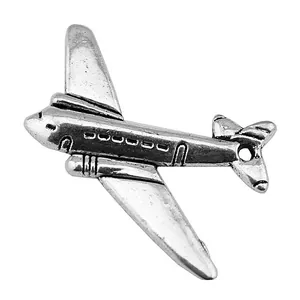Colgante de avión plateado vintage para creación de joyas DIY, medidas 25x31mm.