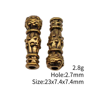 Antique gold Imam prayer beads component with 2.7mm hole and 23mm length detail