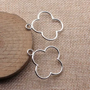 Pendentifs en métal ajouré fleur trèfle à quatre feuilles pour la création de bijoux DIY