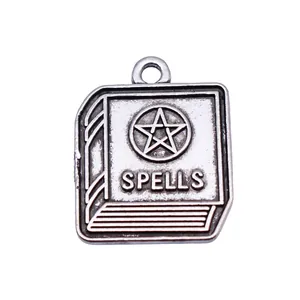 Antique silver spell book charm with pentagram and SPELLS text for DIY jewelry