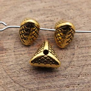 Antique golden triangular textured spacer beads with small holes for DIY jewelry making