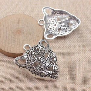 Antique silver leopard head pendant, hollow-out zinc alloy DIY jewelry accessory