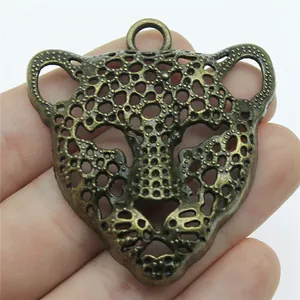 Large antique bronze hollowed-out leopard head pendant charm for DIY jewelry making